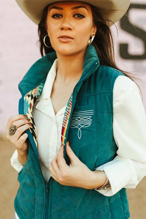 Teal Puffer W Aztec Lining Boot Stitch Detail Vest - Cowhide and Conchos