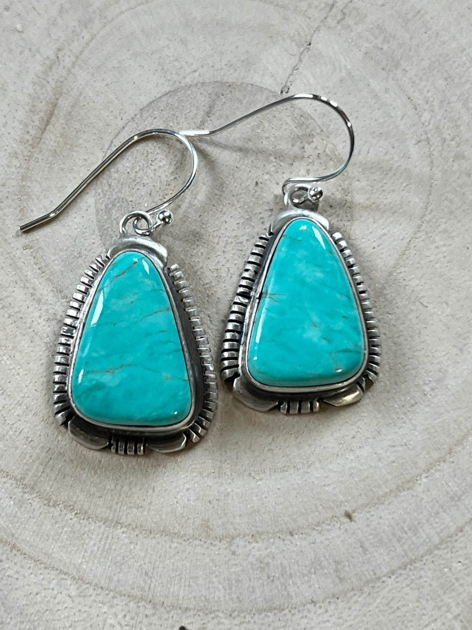 Thomas Francisco Navajo Sterling Silver Earrings with Tyrone Turquoise — 1 5/8" × 3/4" (Hallmarked) - Cowhide and Conchos