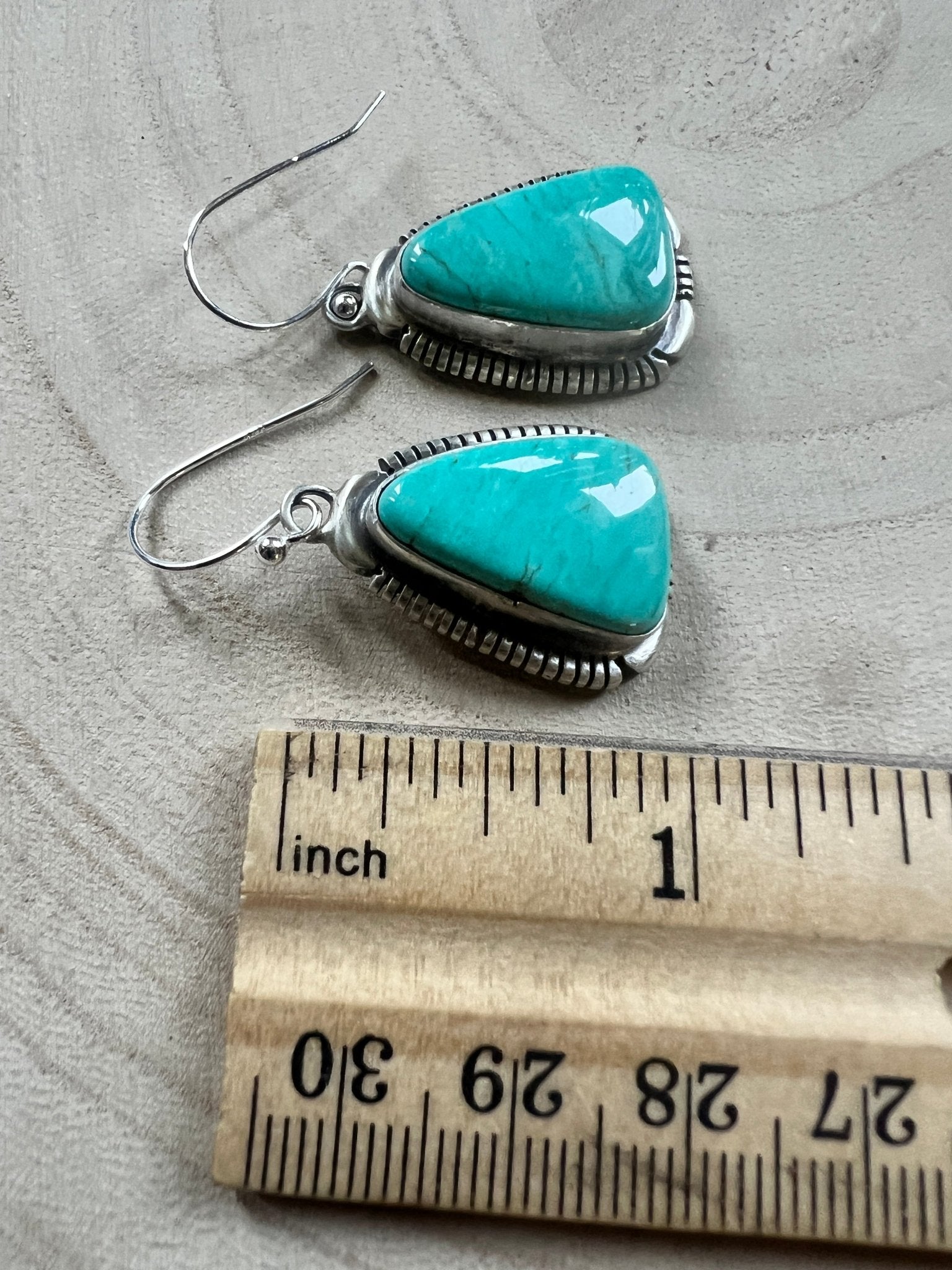 Thomas Francisco Navajo Sterling Silver Earrings with Tyrone Turquoise — 1 5/8" × 3/4" (Hallmarked) - Cowhide and Conchos