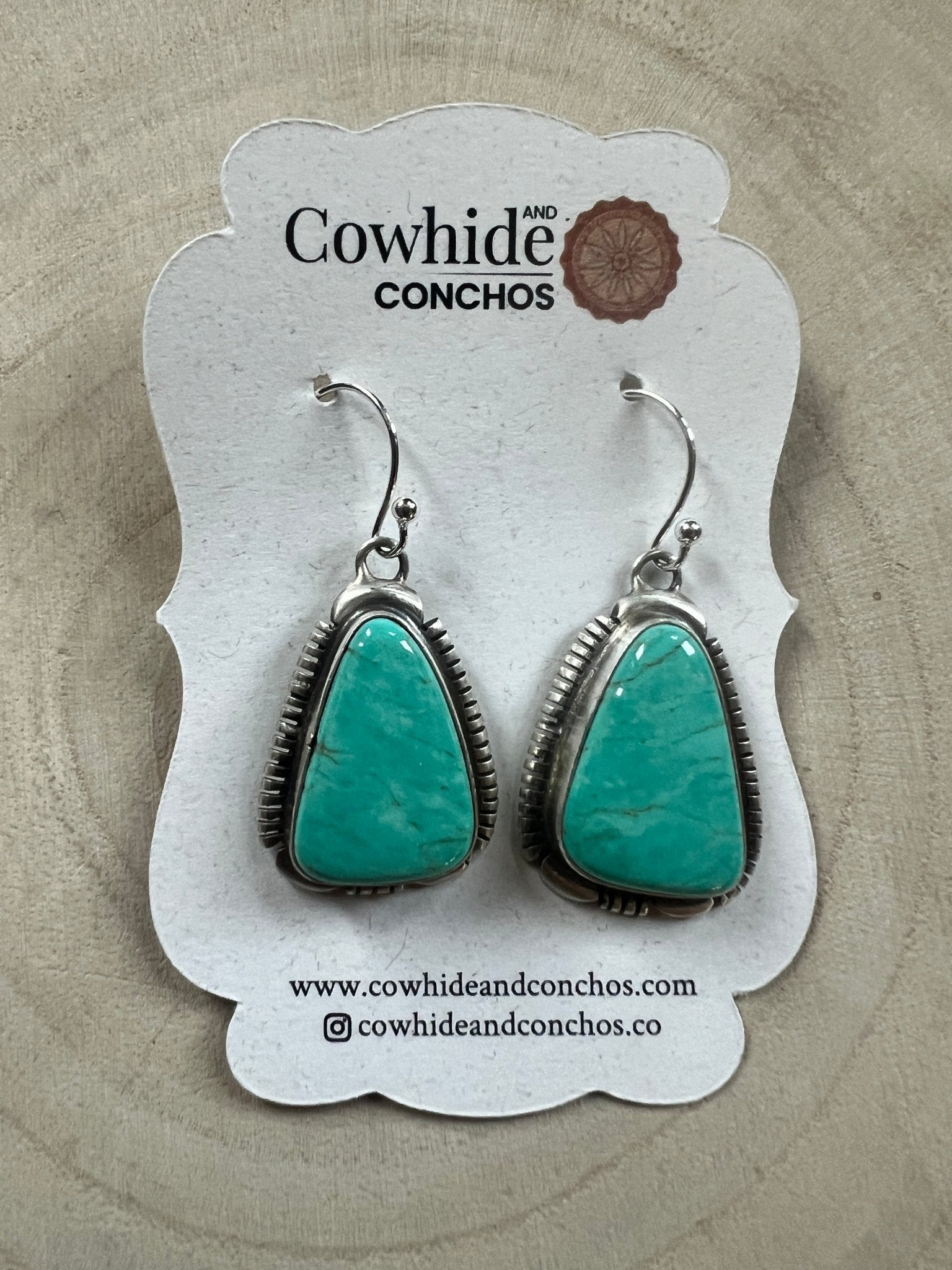 Thomas Francisco Navajo Sterling Silver Earrings with Tyrone Turquoise — 1 5/8" × 3/4" (Hallmarked) - Cowhide and Conchos
