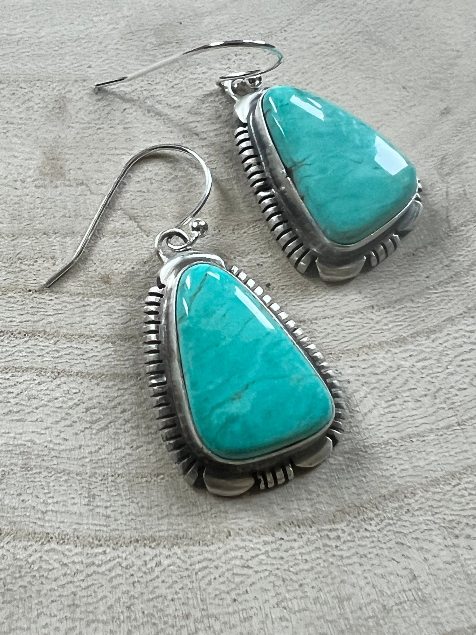 Thomas Francisco Navajo Sterling Silver Earrings with Tyrone Turquoise — 1 5/8" × 3/4" (Hallmarked) - Cowhide and Conchos