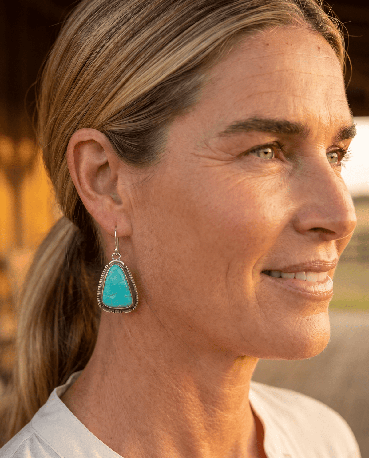 Thomas Francisco Navajo Sterling Silver Earrings with Tyrone Turquoise — 1 5/8" × 3/4" (Hallmarked) - Cowhide and Conchos