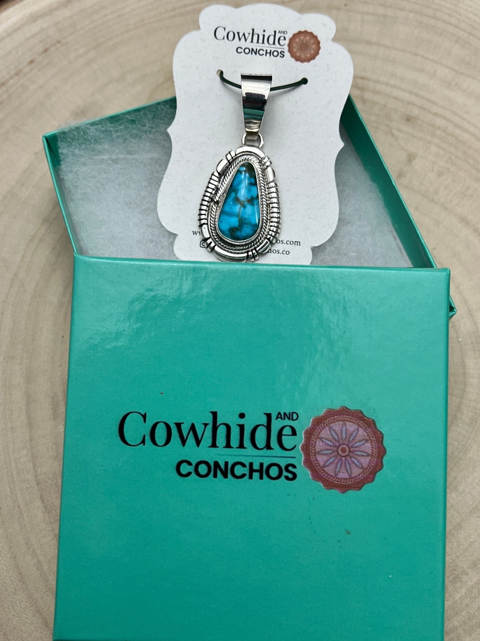 Thomas Francisco Navajo Sterling Silver Pendant with Kingman Turquoise — 2" × 7/8" (Hallmark) - Cowhide and Conchos