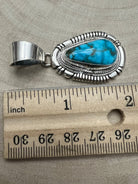 Thomas Francisco Navajo Sterling Silver Pendant with Kingman Turquoise — 2" × 7/8" (Hallmark) - Cowhide and Conchos
