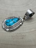 Thomas Francisco Navajo Sterling Silver Pendant with Kingman Turquoise — 2" × 7/8" (Hallmark) - Cowhide and Conchos