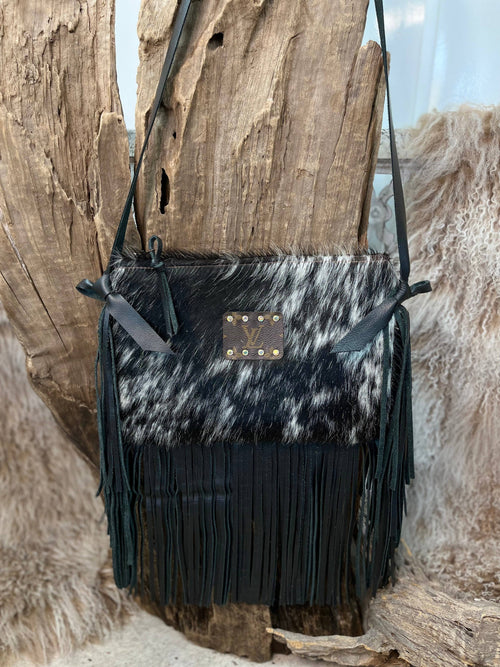 Black Maxine UPCYCLED LV Speckled Handbag in action hanging from branch