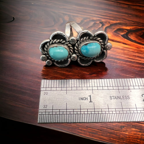 Two turquoise cabochons on sterling silver
