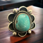 Turquoise ring - gorgeous sky blue cabochon on sterling flower shaped base - Size 7.5