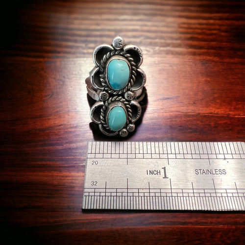 Two turquoise cabochons on sterling silver