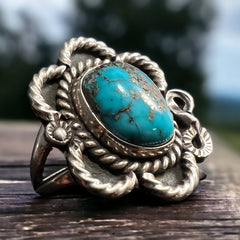 Turquoise ring - gorgeous cabochon on flower shaped sterling base - size 5