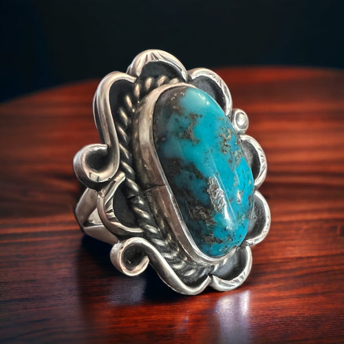 Turquoise ring - gorgeous large cabochon on sterling flower shaped base - size 7