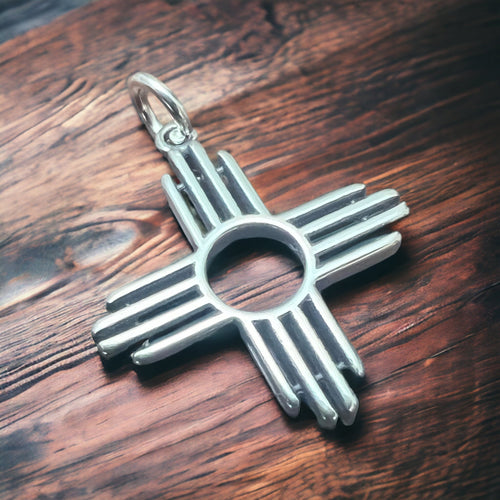 Sterling Zia pendant - Cowhide and Conchos