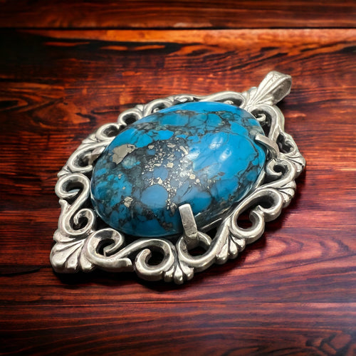 Turquoise pendant - gorgeous turquoise cabochon on cast sterling base - Cowhide and Conchos