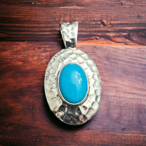 Turquoise pendant - Textured turquoise pendant set on sterling silver - Cowhide and Conchos