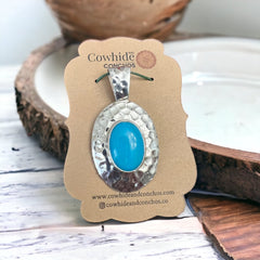Turquoise pendant - Textured turquoise pendant set on sterling silver - Cowhide and Conchos