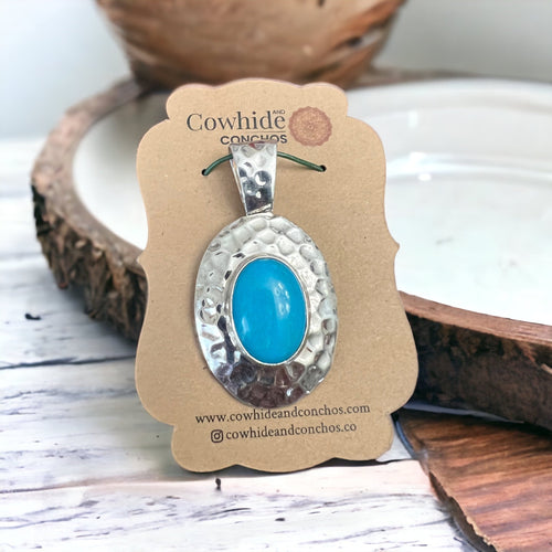 Turquoise pendant - Textured turquoise pendant set on sterling silver - Cowhide and Conchos