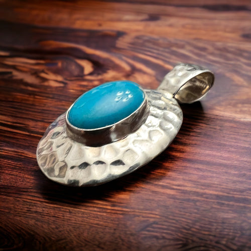 Turquoise pendant - Textured turquoise pendant set on sterling silver - Cowhide and Conchos
