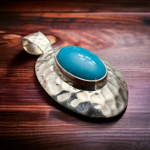 Turquoise pendant - Textured turquoise pendant set on sterling silver - Cowhide and Conchos