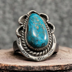 Turquoise ring - beautiful large cabochon on oval twist - Annie Chapo hallmark - Size 6.5 - Cowhide and Conchos