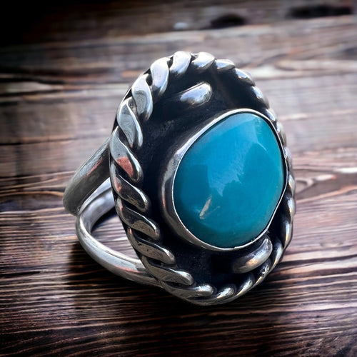 Turquoise ring - beautiful large cabochon on sterling oval shadow box style base - Size 7.5 - Cowhide and Conchos