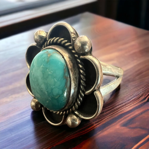 Turquoise ring - gorgeous sky blue cabochon on sterling flower shaped base - Size 7.5 - Cowhide and Conchos