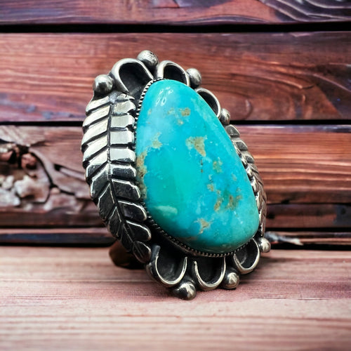 Vintage signed Navajo sterling silver and turquoise with leaf - Cowhide and Conchos
